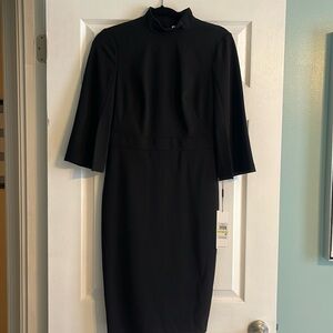 Gorgeous black Calvin Kline dress brand new with tags.